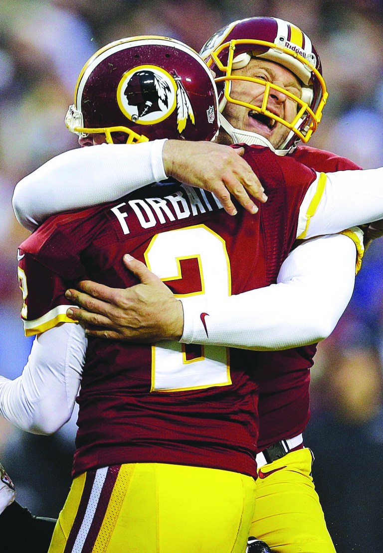 Patrick Semansky/AP
Kai Forbath kicked three field goals Sunday, including the 34-yarder in overtime that won the game for the Redskins.