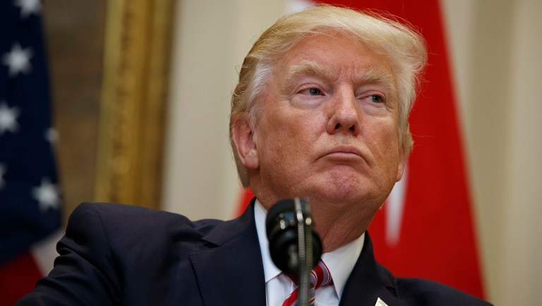 The New York Times reported that President Trump pushed former FBI Director James Comey to drop his investigation of former national security adviser Mike Flynn. (AP Photo/Evan Vucci)