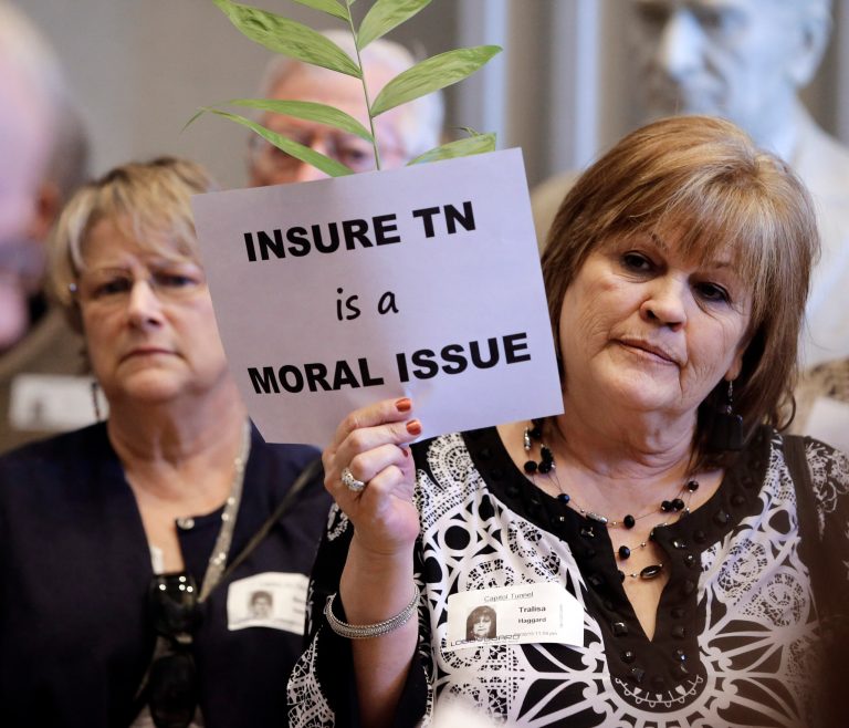 Tralisa Haggard, right, stands outside the Tennessee Senate chamber during a rally to show of support for Gov. Bill Haslam's Insure Tennessee plan, Monday, March 30 in Nashville. (AP Photo/Mark Humphrey)