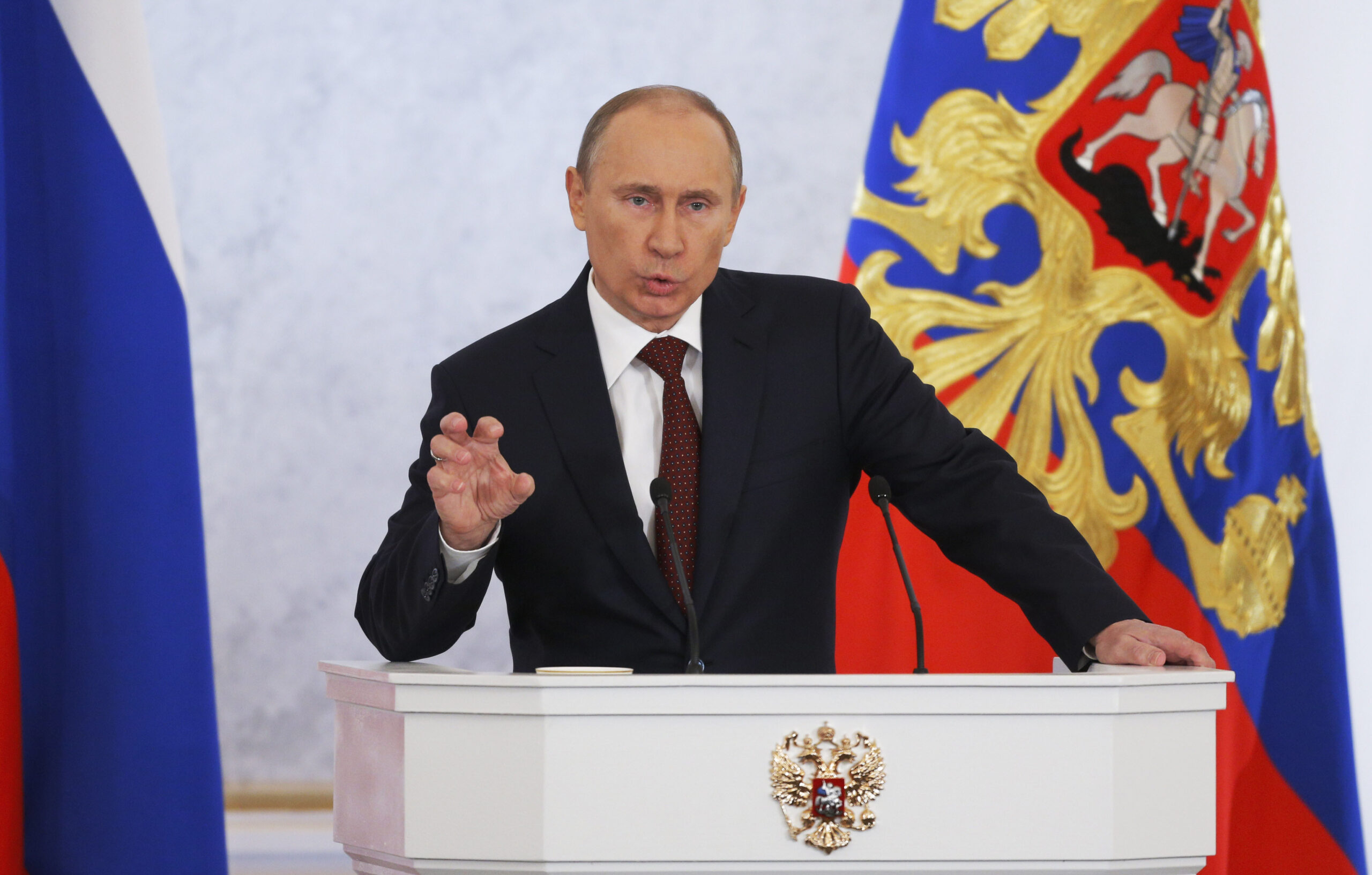 Putin rejects foreign advice on democracy