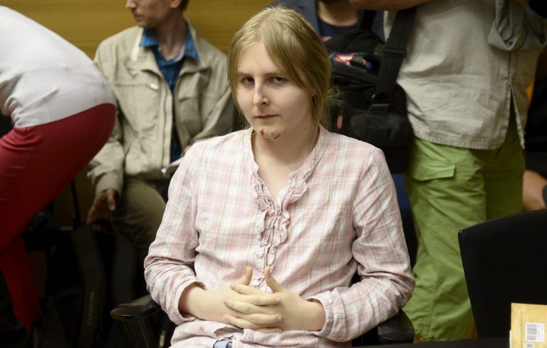 Nita-Minttu Tirkkonen pictured in Helsinki Regional Court, in Helsinki, Finland, Thursday May 26, 2014. A court in Finland has convicted a man and a woman of plotting to kill dozens of people at the country's largest university and sentenced them to at least three years each in prison. In its Friday June 27 2014 verdict, the Helsinki Regional Court found the pair, both aged 24, guilty of possessing weapons, ammunition and chemicals meant 