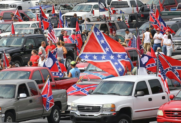 Virginia's Department of Motor Vehicles will begin recalling state-issued license plates that feature the Confederate flag.Â (Curtis Compton/Atlanta Journal-Constitution via AP)