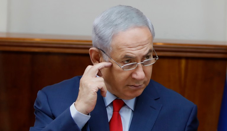 Israeli police disclosed last week that Netanyahu is suspected of crimes involving fraud, breach of trust and bribes. (Gali Tibbon, Pool via AP)