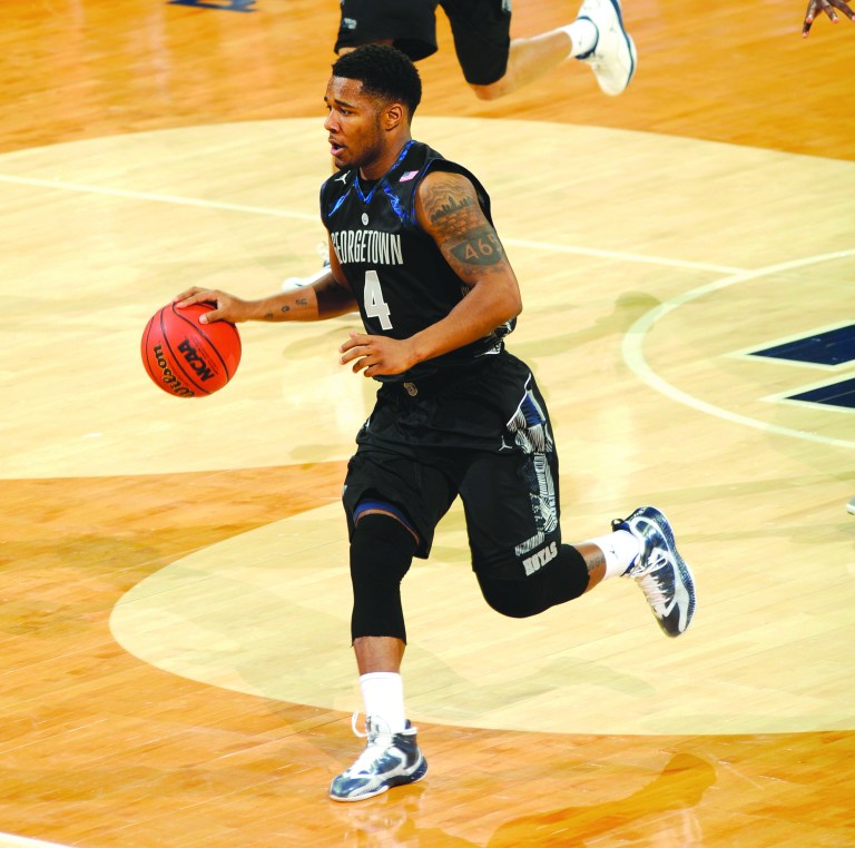 Joe Raymond/AP
Freshman D'Vauntes Smith-Rivera finished with 14 points Monday as Georgetown routed No. 24 Notre Dame on the road.