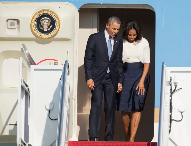 President Barack Obama and first lady Michelle Obama disembark from Air Force One as they arrive Andrews Air Force Base, Md., Thursday, April 10,  2014, from a trip in Texas.  (AP Photo/Manuel Balce Ceneta)