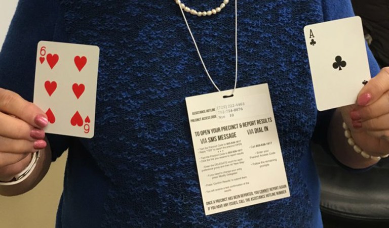 In Precinct 10, cards were drawn to break a tie between Bernie Sanders and Hillary Clinton. Sanders' draw was a six, Clinton's draw was an ace. (Reid Epstein/image courtesy Twitter)