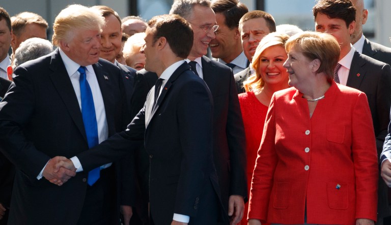 President Trump's handshake with French President Emmanuel Macron was hardly the first time Trump's forceful greetings have gained notice. (AP Photo/Evan Vucci)