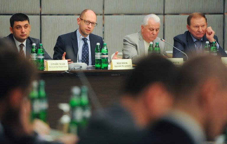 Ukraine's Prime Minister Arseniy Yatsenyuk, second left, and Ukraine's former presidents Leonid Kuchma, first right, and Leonid Kravchuk, second right, during a round table reform discussion in Ukraine's eastern city of Kharkiv on Saturday, May 17, 2014. First left is Minister of regional development Volodymyr Groisman. (AP Photo/Andrew Kravchenko, pool)