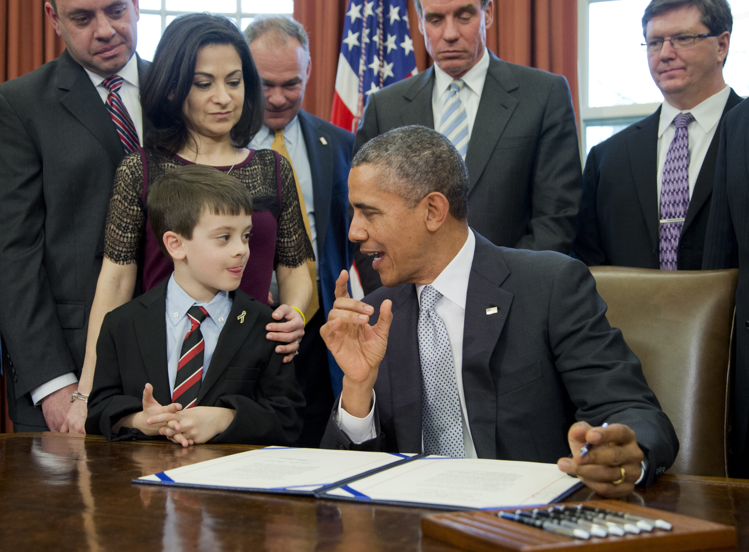 Obama signs cancer research bill in memory of girl