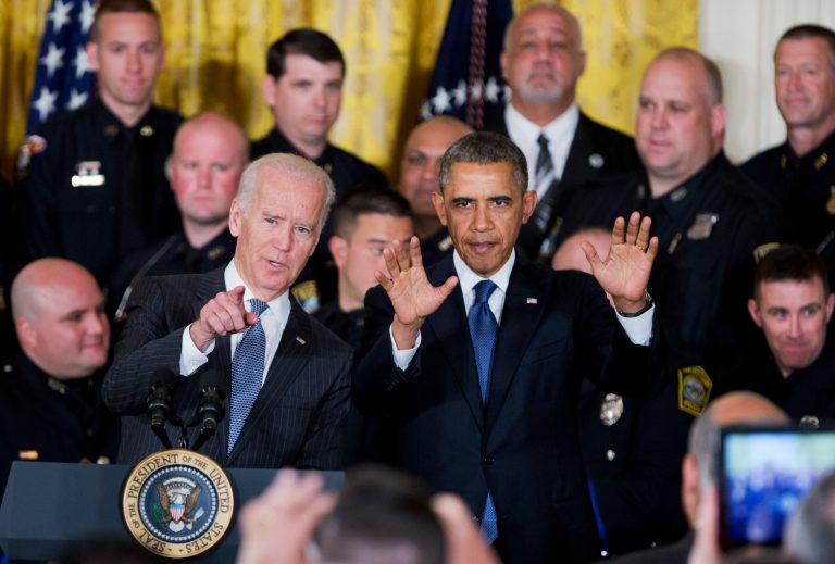 President Barack Obama, right, and Vice President Joe Biden, left, wave to the invited law enforcement officers and their families, as during a ceremony honoring the 2014 National Association of Police Organizations (NAPO) TOP COPS recipients in the East Room of the White House in Washington, Monday, May 12, 2014.   (AP Photo/Manuel Balce Ceneta)