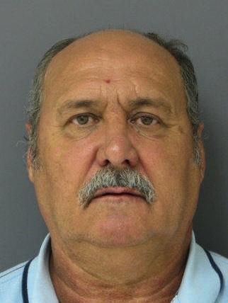Jail officer charged in investigation of murder-for-hire plot
