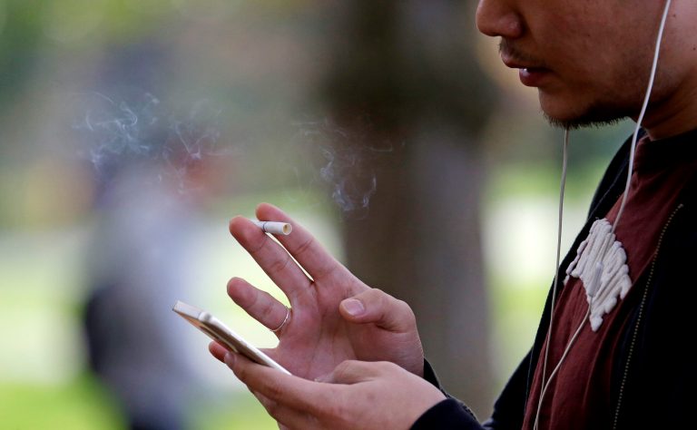 Of the more than 2 million LGBT young adults, more than 800,000 smoke occasionally, the FDA claims. (AP Photo/Elaine Thompson)
