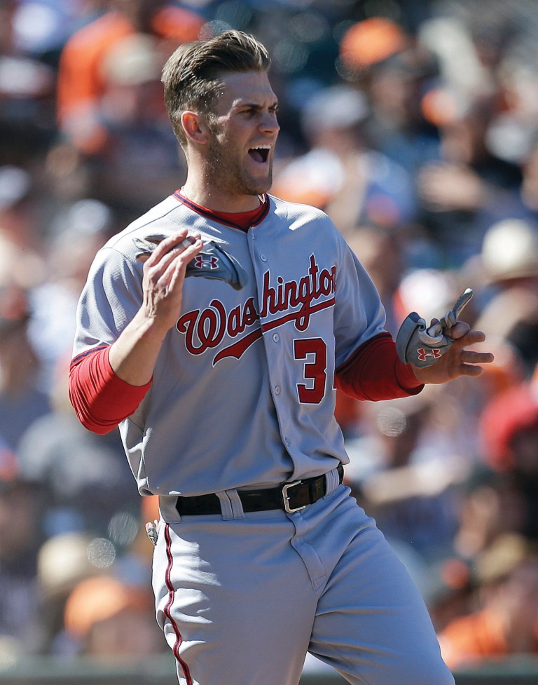 Ben Margot/AP
Outfielder Bryce Harper's run in the tenth inning helped the Nationals beat the Giants on Wednesday, putting Washington back above .500 on the season.