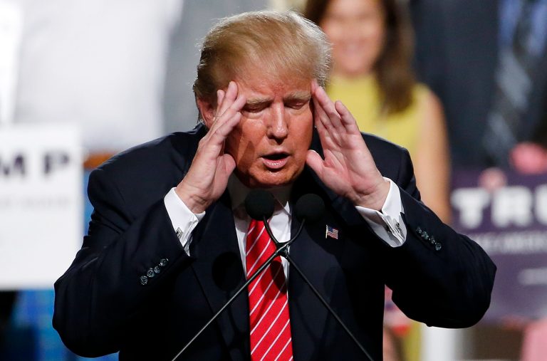 Republican presidential candidate Donald Trump pauses as he speaks before a crowd of 3,500 Saturday, July 11, 2015, in Phoenix. (AP Photo/Ross D. Franklin)