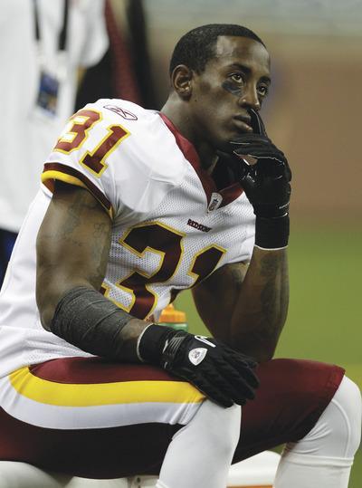 Paul Sancya/AP
Phillip Buchanon, who was suspended the first four weeks for using a performance-enhancing drug, was back at practice Tuesday.