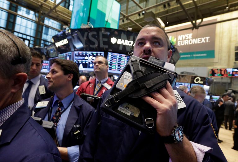 Global stock markets were mostly higher Thursday as President Obama prepares to meet with top Republican leaders in hopes of ending an impasse over the nation's borrowing limit. (AP/Richard Drew)