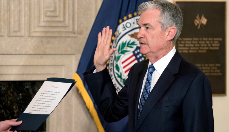 Jerome Powell takes the oath of office as the new chairman of the Federal Reserve, Monday, Feb. 5, 2018, in Washington. (AP Photo/Andrew Harnik)