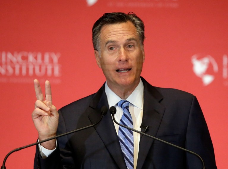 Mitt Romney came out Friday against Donald Trump and warned that nominating the billionaire businessman would be disastrous for the Republican Party and America. (AP Photo)