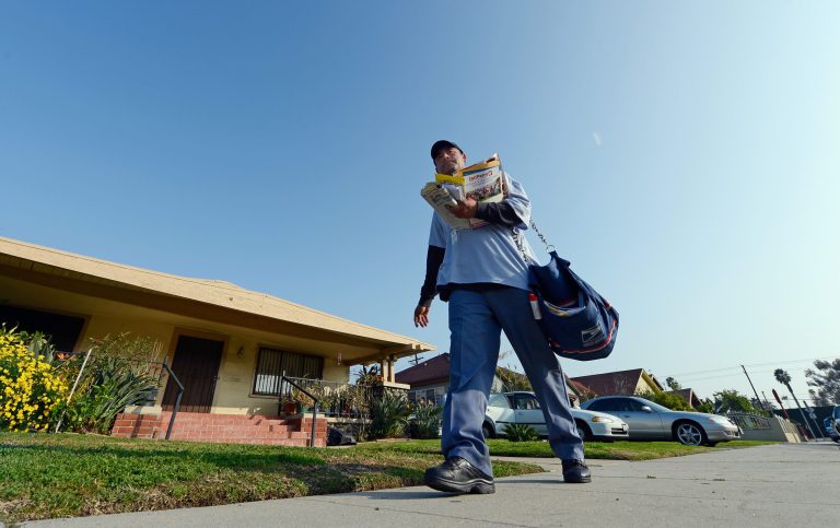 Daily on their routes, letter carriers save elderly residents who've fallen or taken ill, remove people from burning cars after accidents, find missing children and stop crimes in progress.Â (Photo by Kevork Djansezian/Getty Images)