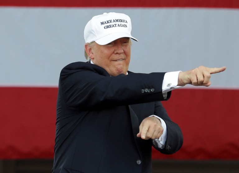 The particular loophole the tax officials accuse Donald Trump of exploiting has tripped up presidential candidates before. (AP Photo)