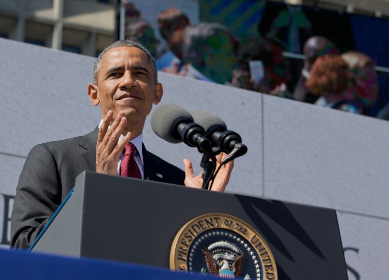 President Barack Obama applauds as he pays tribute to disabled U.S. veterans at the American Veterans Disabled for Life Memorial dedication ceremony in Washington, Sunday, Oct. 5, 2014.   (AP Photo/Manuel Balce Ceneta)