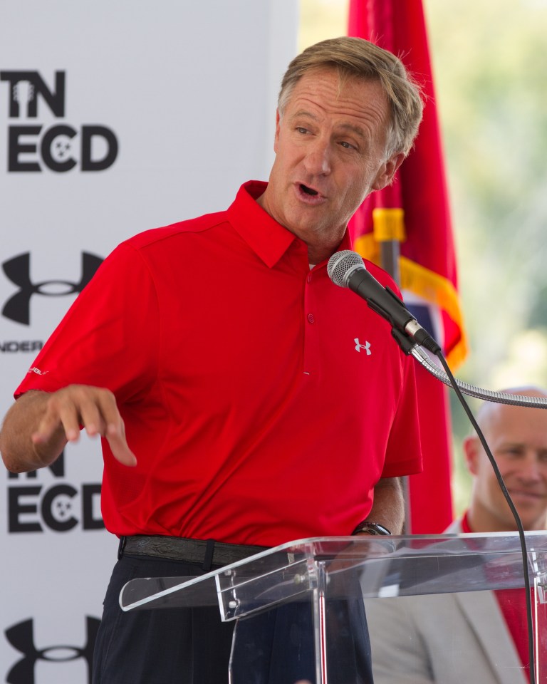 Tennessee Gov. Bill Haslam speaks at a ceremony to announce sports apparel maker Under Armour will build a new $100 million distribution center in Mt. Juliet, Tenn., on Thursday, Oct. 2, 2014. Under Armour expects to hire 1,500 workers at the facility scheduled to open in early 2016. (AP Photo/Erik Schelzig)