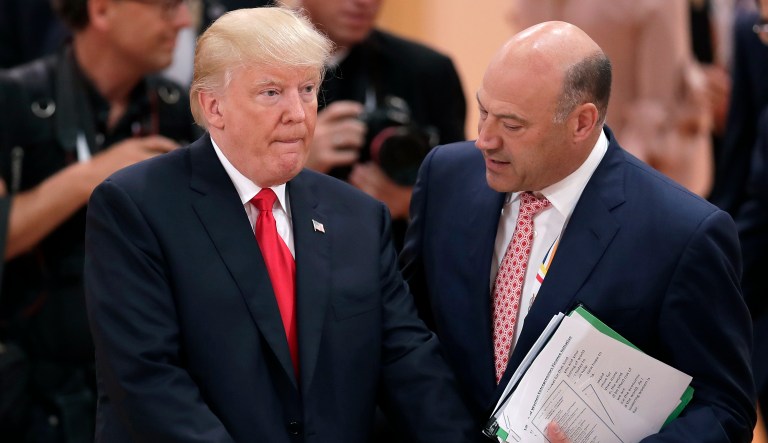 White House chief economic adviser Gary Cohn talks to President Trump prior to a working session at the G-20 summit in Hamburg, Germany, Saturday, July 8, 2017. Trump suggested Tuesday that he is eyeing Cohn as a possible replacement for Janet Yellen as chairman of the Federal Reserve. (AP Photo/Michael Sohn)
