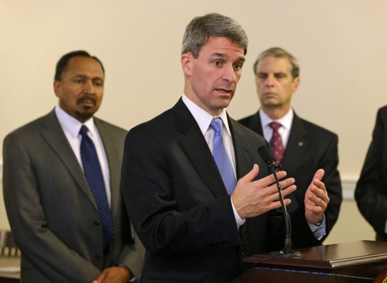 Republican gubernatorial candidate, Virginia Attorney General Ken Cuccinelli, center, gestures during a press conference at the Capitol in Richmond, Va., on Tuesday. (AP/Steve Helber)