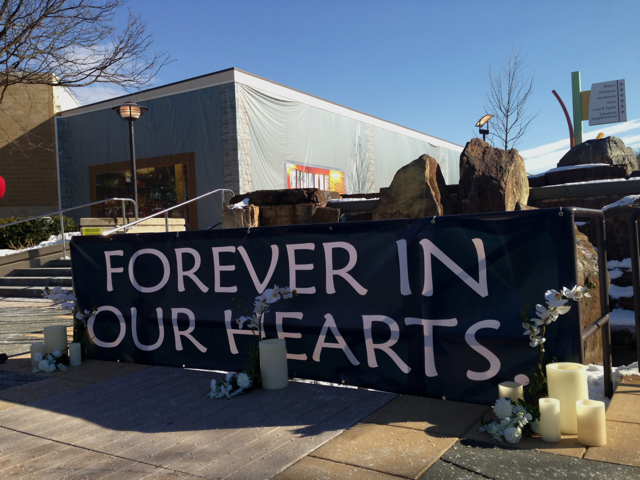 Shooting victims remembered as mall reopens
