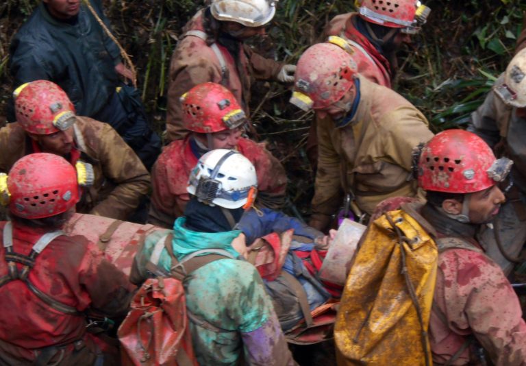 Rescue workers carry injured Spanish speleologist Cecilio Lopez after his rescue from inside the Inti Machay cave, in Leimebamba, Peru, Tuesday, Sept. 30, 2014. Lopez, a well-known cave explorer, was hurt when he fell inside the Inti Machay cave, where he remained trapped underground for 12 days in Peru's remote Amazon region. (AP Photo/Mauricio Munoz)