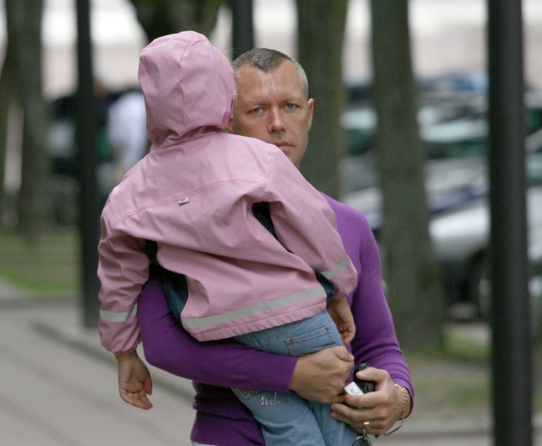   In this photo made in June, 2009, Drasius Kedys is pictured with his daughter, Deimante Kedys, in Lithuania. Kedys claimed his daughter was being abused by a pedophile ring involving the girl's mother and including judges and politicians that he claimed preyed on his then 5-year-old daughter. After a complicated series of events Drasius Kedys was found dead under mysterious circumstances two years ago. Kedys' funeral was attended by thousands of Lithuanians who had come to regard him as a martyr who dared fight an allegedly corrupt justice system. (AP Photo/Modestas Patasius) Eds note: photo dated June, 2009.  