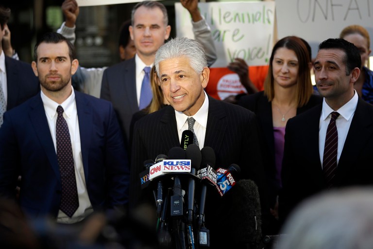 Daniel Petrocelli, lead attorney for President-elect Trump, speaks after a hearing involving a lawsuit against the now-defunct Trump University Friday. Trump agreed Friday to pay $25 million to settle the lawsuits. (AP Photo/Gregory Bull)