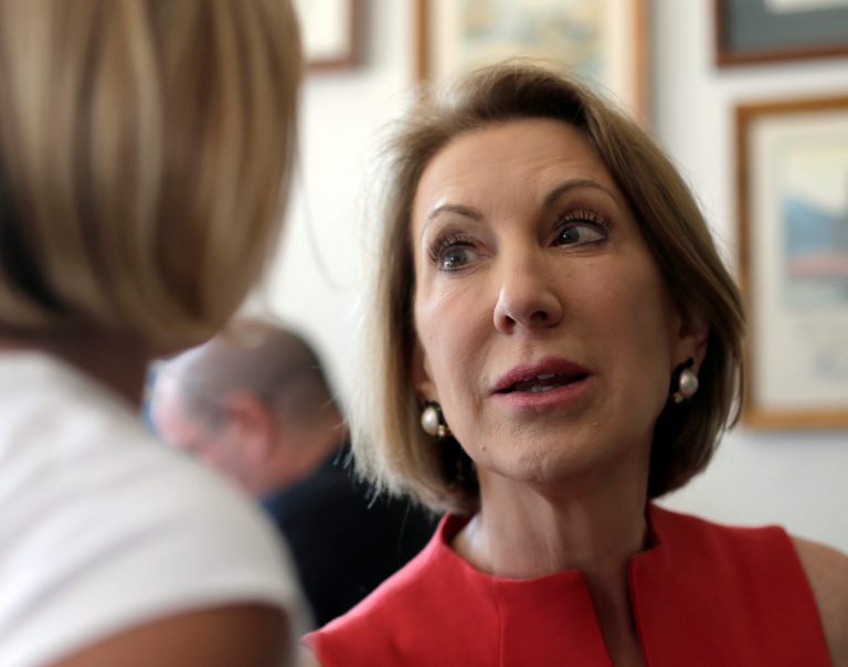 Fiorina cited Trump's openness to running on a third-party ticket and some of his policy positions. (AP Photo/Charlie Riedel)