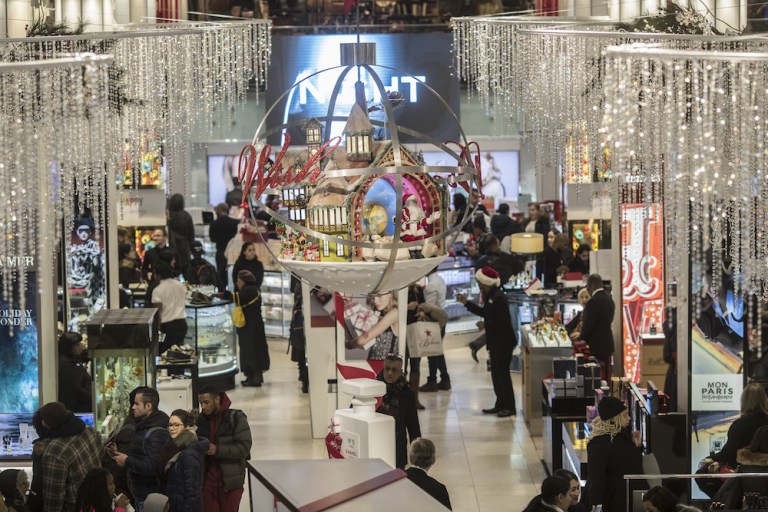 Shoppers walk through a Macy's Inc. department store in New York. U.S. retailers fear the Trump administration's decision to impose metals tariffs is igniting a trade war in which 