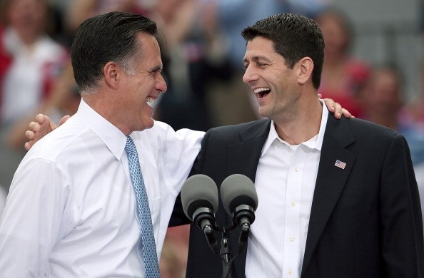 Republican presidential candidate Mitt Romney (L) jokes with Rep. Paul Ryan (R-WI) (R) after announcing him as the "next PRESIDENT of the United States" during an event announcing him as his running mate. (Getty Images)
