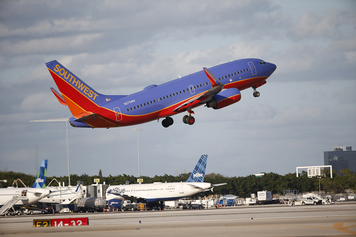 Southwest pilot arrested carrying loaded gun through airport security