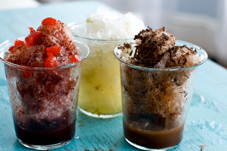   This image taken on June 5, 2012 shows cherry cola shaved ice, left, a mocha shaved ice, right, and coconut-lime shaved ice in Concord, N.H. (AP Photo/Matthew Mead)  