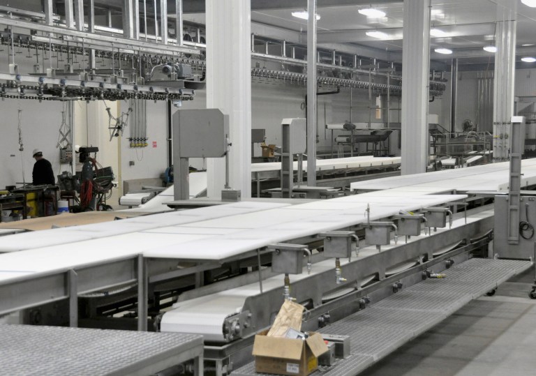 This April 2, 2012 file photo shows the fabrication room of the Northern Beef Packers processing plant in Aberdeen, S.D. Northern Beef Packers was one of a handful of large projects in South Dakota to solicit funds from the federal EB-5 program, which allows foreigners to get visas if they invest $500,000 to $1 million in projects or businesses that create jobs for U.S. citizens. (AP Photo/Dirk Lammers, File)