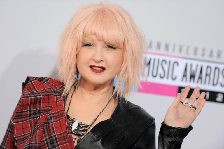 She's so unusual: Cyndi Lauper arrives at the 40th Anniversary American Music Awards on Sunday, Nov. 18, 2012, in Los Angeles. (Photo by Jordan Strauss/Invision/AP)
