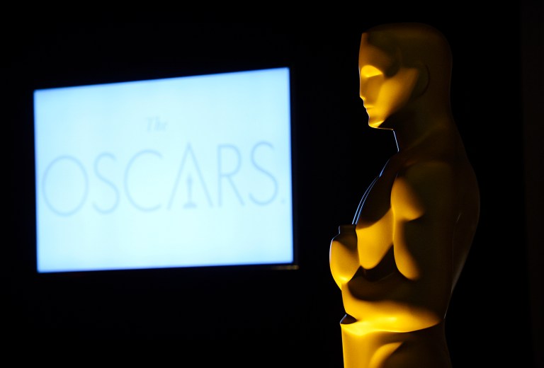 America may be divided politcally, but it's united in a love of football and ambivalence towards the Oscars. (Photo by Chris Pizzello/Invision/AP)