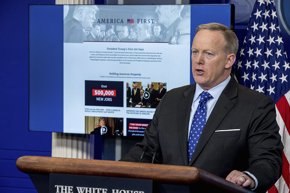 Spicer says Trump wants funding for wall in spending bill, but dodges on shutdown threat