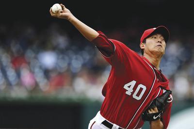 Patrick Smith/Getty Images
Right-hander Chien-Ming Wang allowed one run on four hits in six innings and added his first career hit in the Nationals'victory over the Braves at home Saturday.
