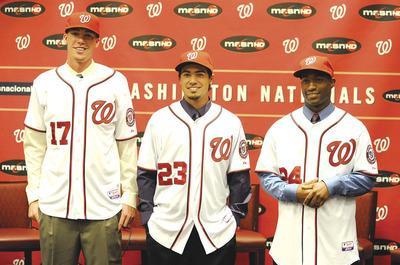 Greg Fiume/Getty ImagesAlex Meyer, left; Anthony Rendon, center; and Brian Goodwin were part of a strong 2011 draft class that helped convince Baseball America to rank the Nationals'farm system No. 1 in major league baseball.