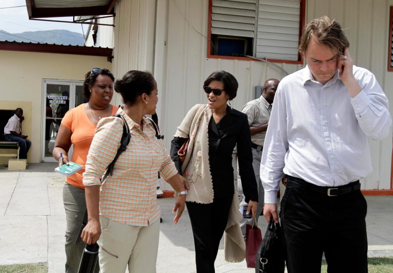 Mills maintains that her time spent working for the foundation constituted volunteer work. (AP Photo/Dieu Nalio Chery)