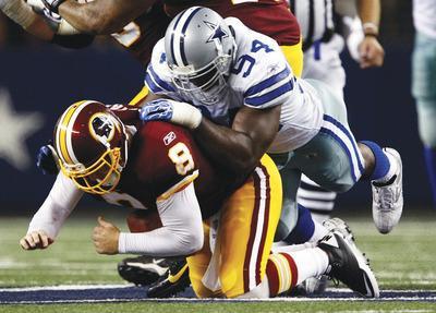 Jose Yau/AP
Rex Grossman threw one interception and lost a fumble Monday night and now has 13 turnovers in six starts with the Redskins.