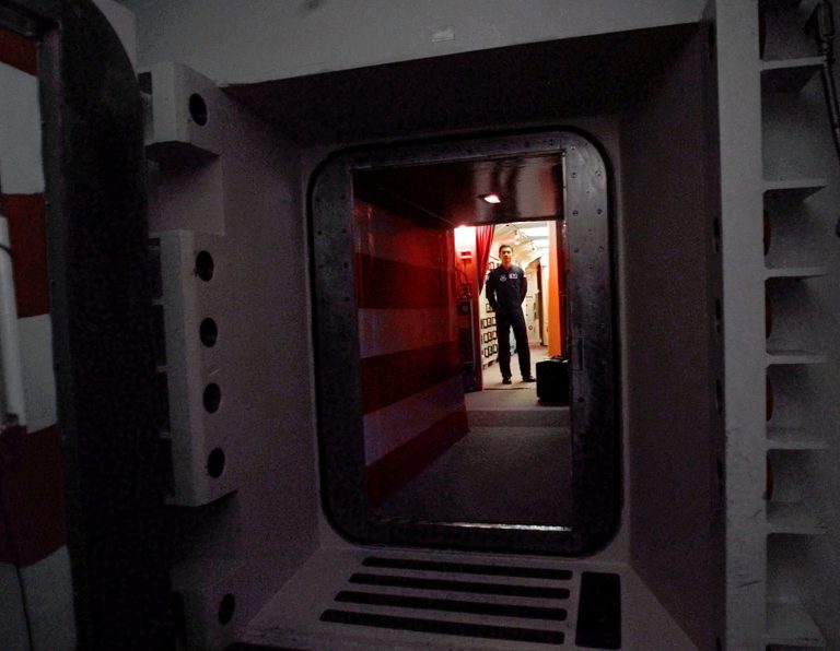 An Air Force missile crew commander stands at the door of his launch capsule 100 feet underground where he and his partner are responsible for 10 nuclear-armed ICBM's in north-central Colorado. (AP/Eric Draper)
