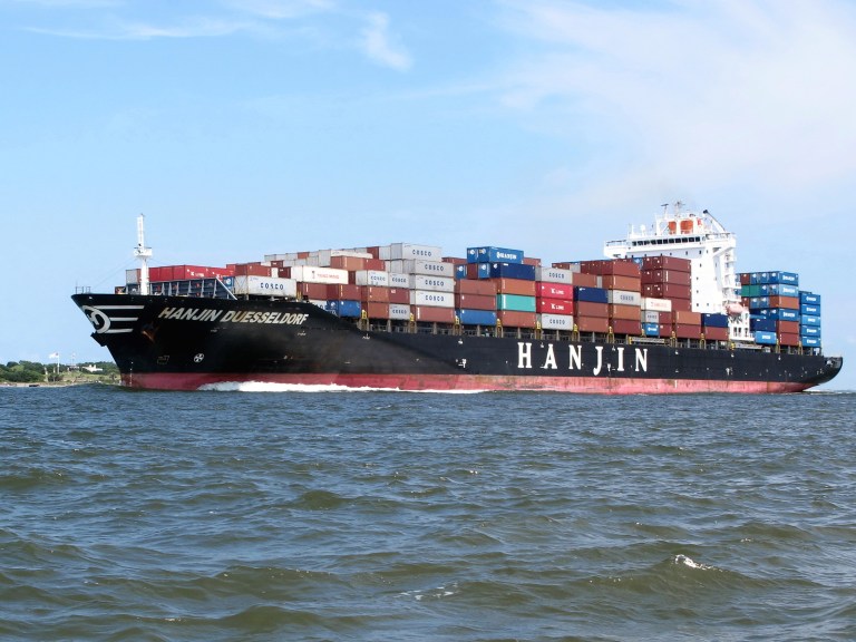FILE - In this July 18, 2013 file photo, a container ship moves through the Charleston, S.C., harbor. The South Carolina Ports Authority announced on Wednesday, June 18, 2014 that during May 2014 the Port of Charleston handled almost 92,000 shipping containers, an increase of more than 15 percent over May of last year and the busiest month at the port in more than seven years. (AP Photo/Bruce Smith, file)