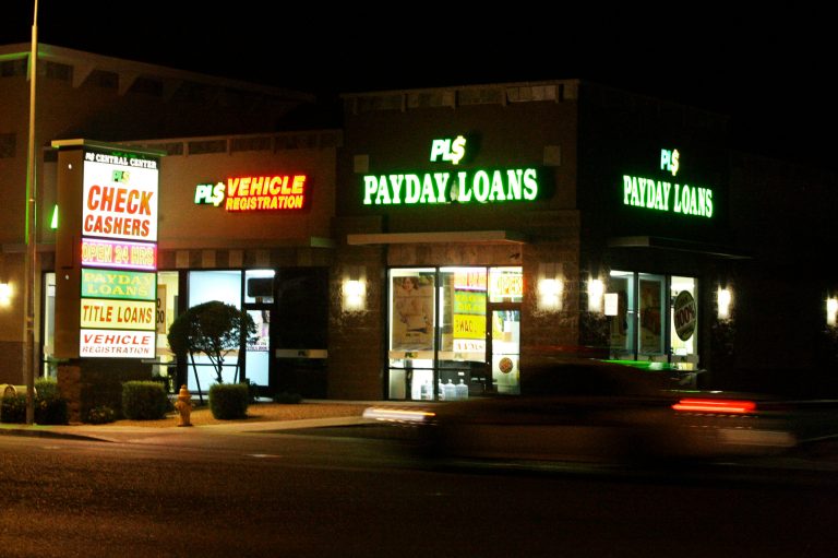 Two Democratic congressmen are sponsoring a bill that would further stiffen limits on payday loans that target military members or their families.Â (AP Photo/Ross D. Franklin)