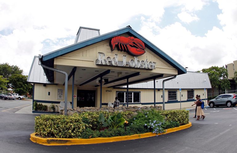 FILE - This Thursday, Sept. 6, 2012, file photo, shows a Red Lobster restaurant in Hialeah, Fla. Darden Restaurants on Friday, May 16, 2014 said it entered an agreement to sell its Red Lobster chain to investment firm Golden Gate Capital in a $2.1 billion cash deal. (AP Photo/Alan Diaz, File)