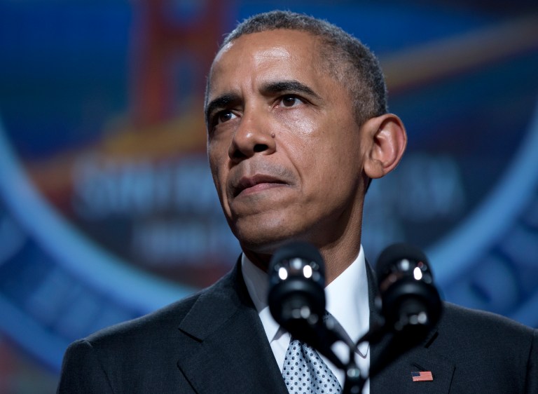 President Obama said the United States is still struggling with racism decades after the civil rights movement and underscored the point by using the 